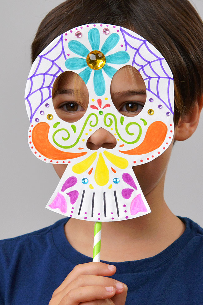 Wearing a Day of the Dead sugar skull kids craft