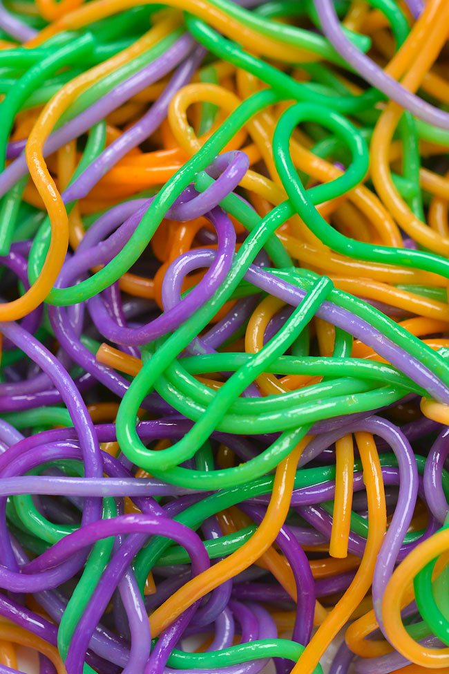Closeup of food colouring dyed Halloween spaghetti noodles