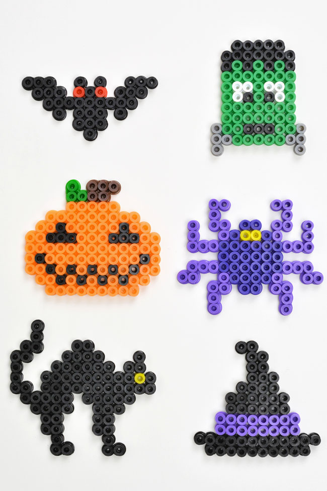 Bat, Frankenstein, jack-o-lantern, spider, black cat, and witch hat made from Perler beads