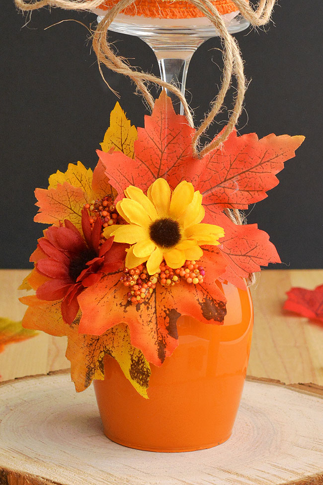 Fall candle holder made from a wine glass