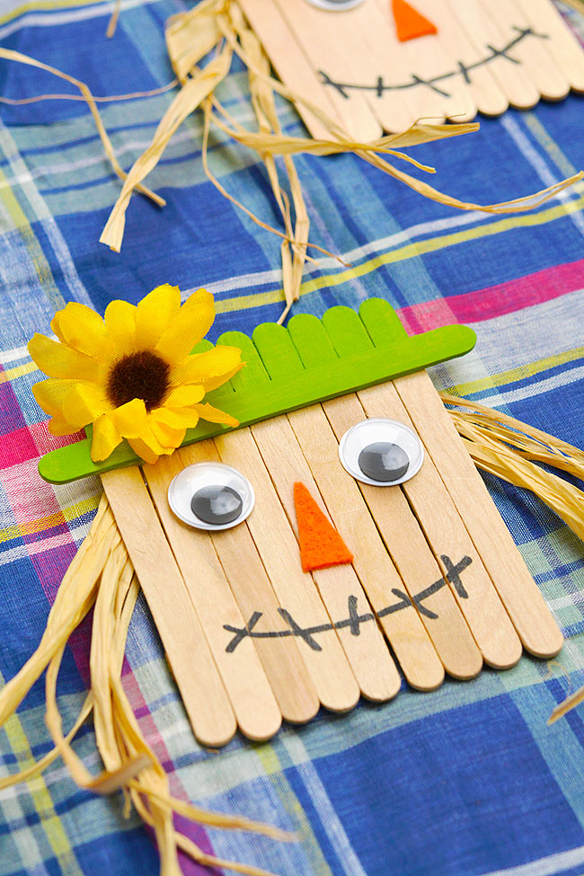 Scarecrow fall decoration made with craft sticks