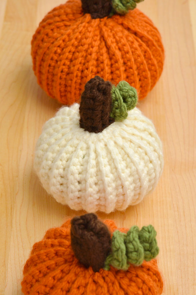 Crochet pumpkins in a row