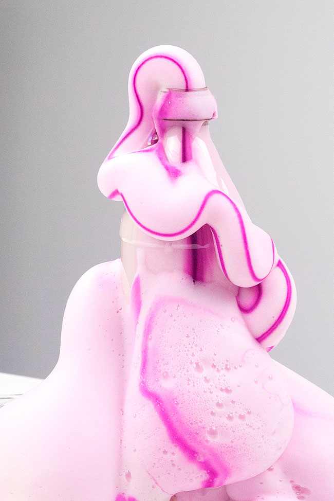 Elephant toothpaste experiment with purple food colouring