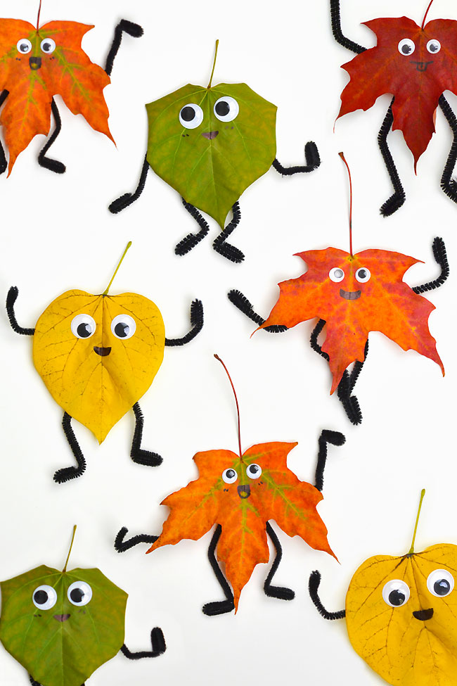 Leaf people made with pipe cleaners, googly eyes, and real fall leaves