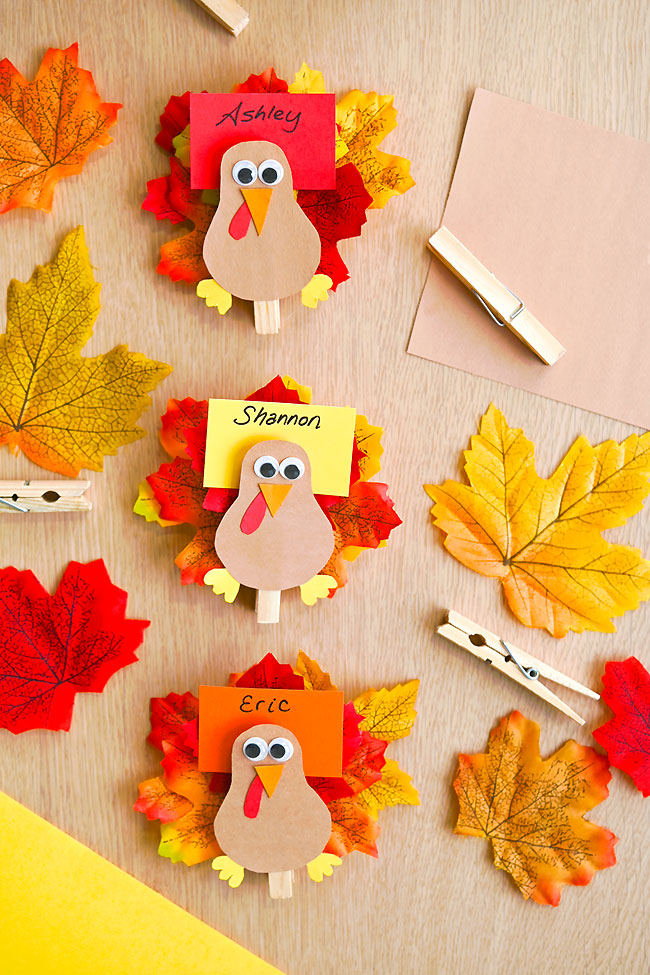 DIY turkey place cards with craft supplies to make them