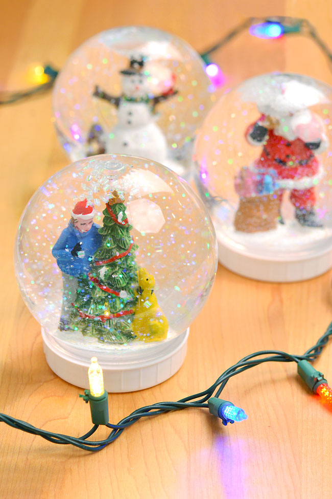 DIY snow globes surrounded by Christmas lights