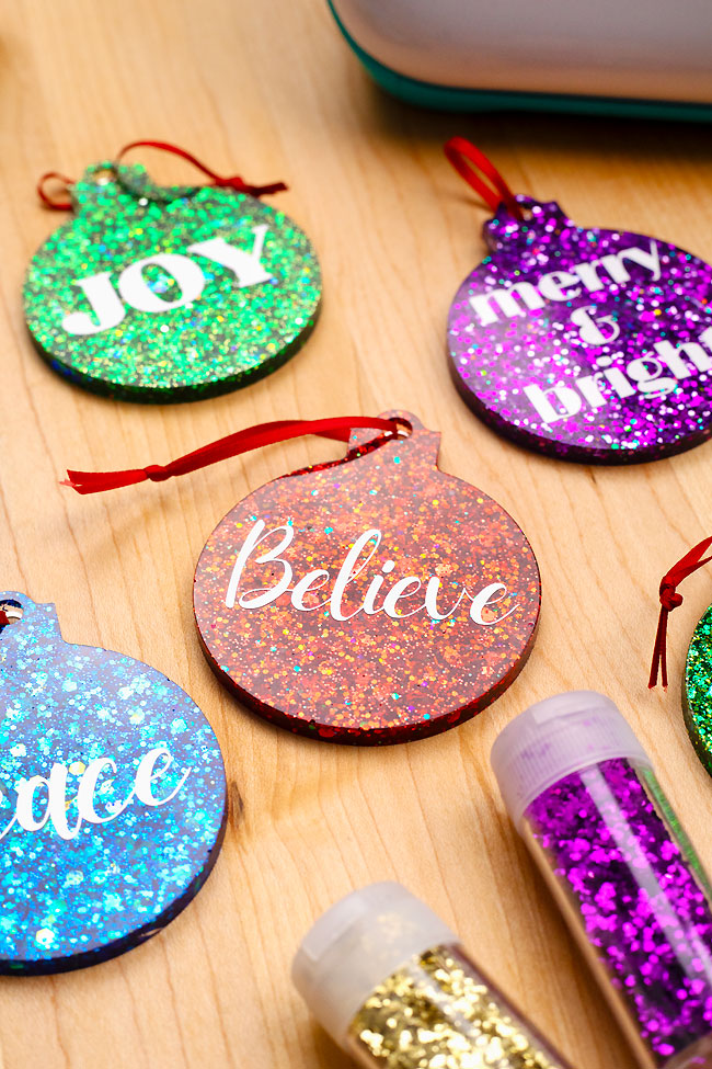 Colourful DIY Christmas ornaments made with resin and glitter