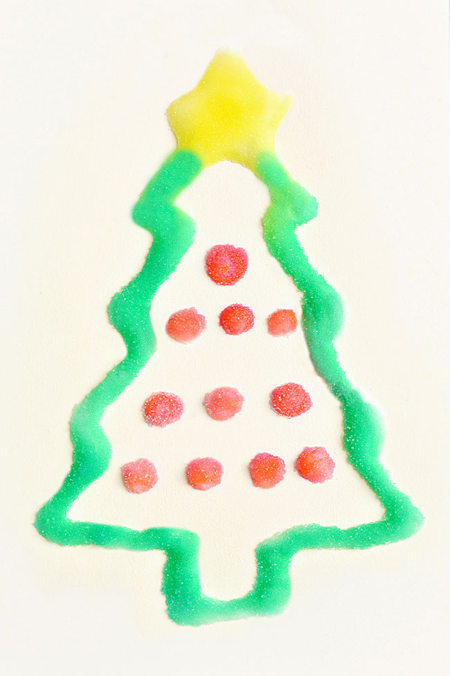 Salt painted Christmas tree with liquid watercolor paint