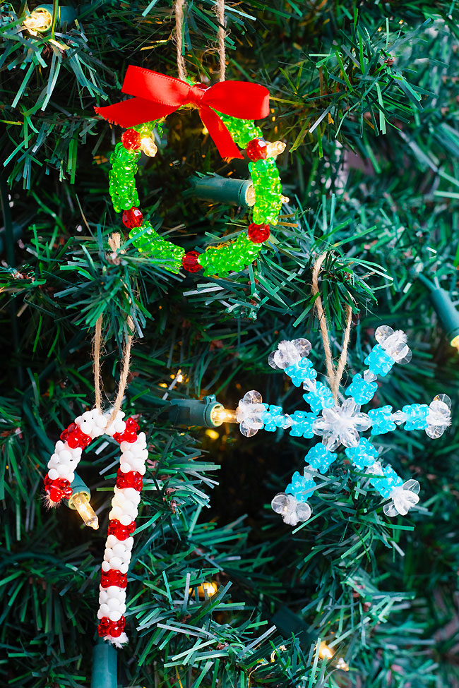 Beaded Christmas ornaments hanging on a Christmas tree