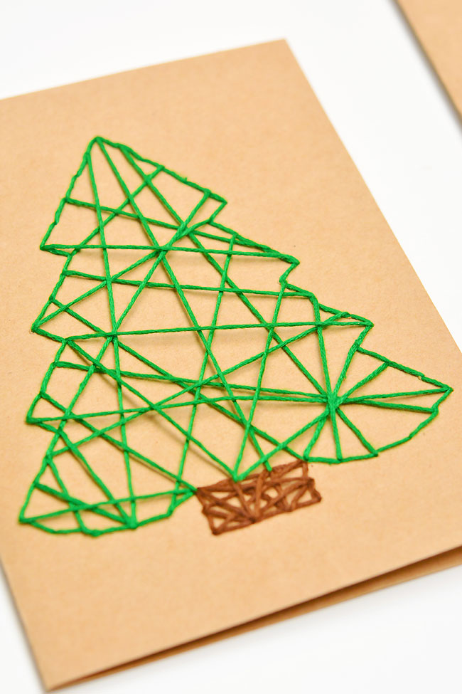 Close up of a Christmas tree string art card