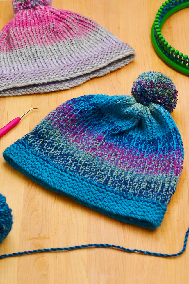 Easy loom knit hat project with variegated yarn