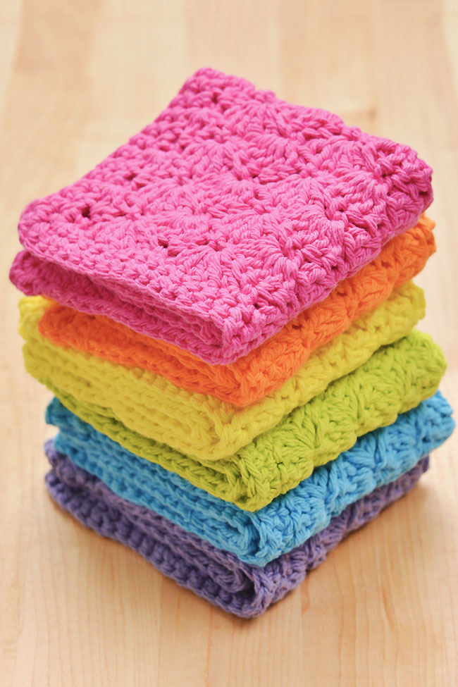 Folded pile of crochet dish cloths