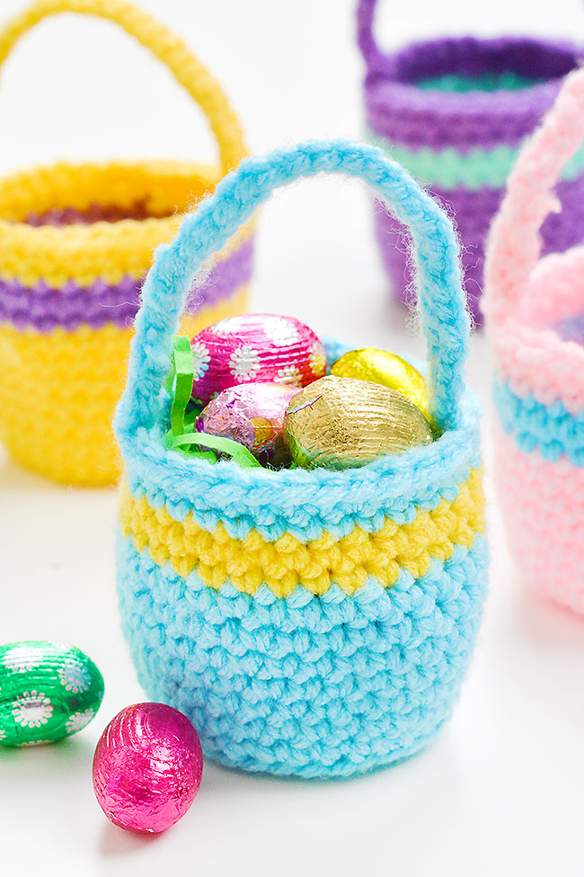 Crochet Easter basket filled with chocolate eggs