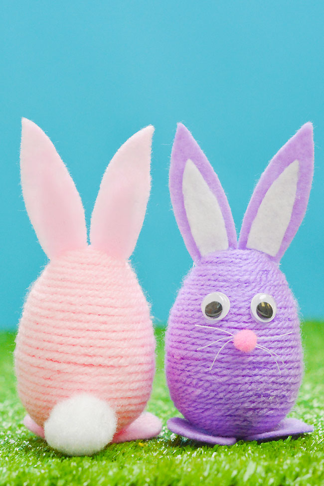 Showing the front and back of yarn wrapped egg bunny