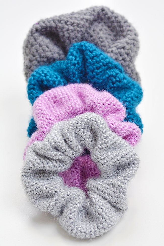 Pile of cute and soft crochet scrunchies