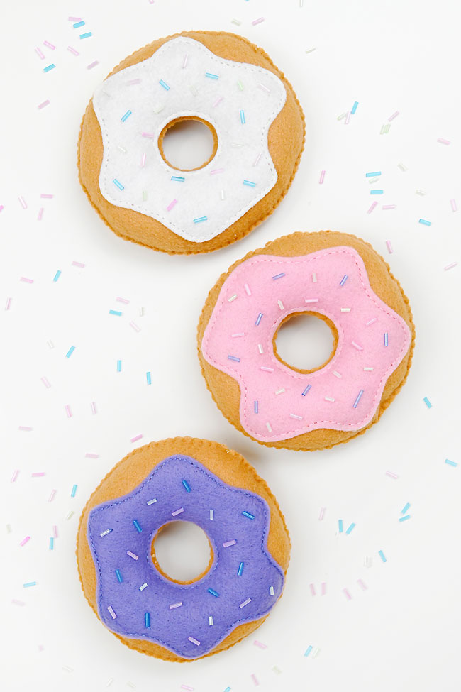 Cute felt donut soft toys made with a free, printable pattern