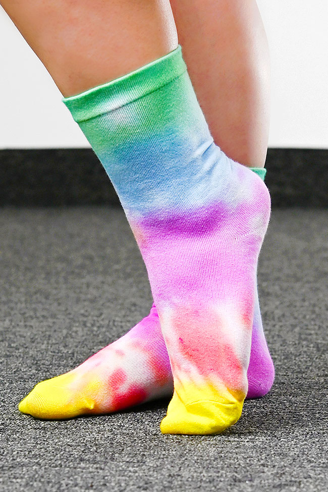 Wearing rainbow tie dye socks
