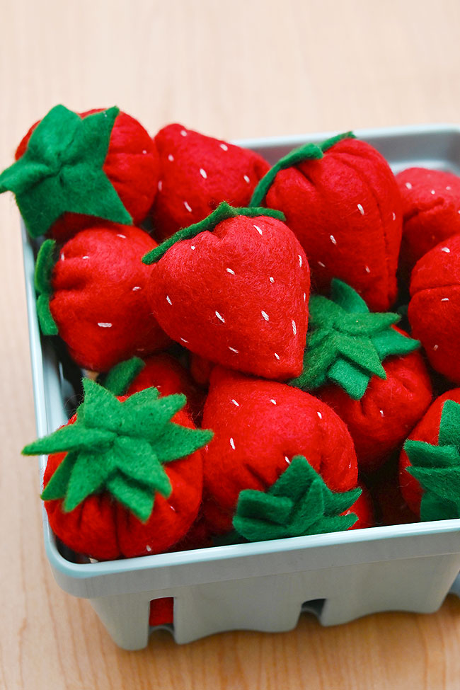 Fruit basket full of felt strawberries