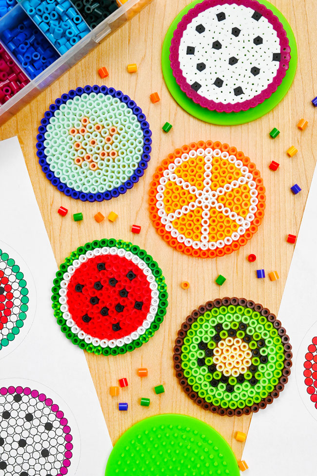 Fun Perler bead fruit ideas made on a circle pegboard