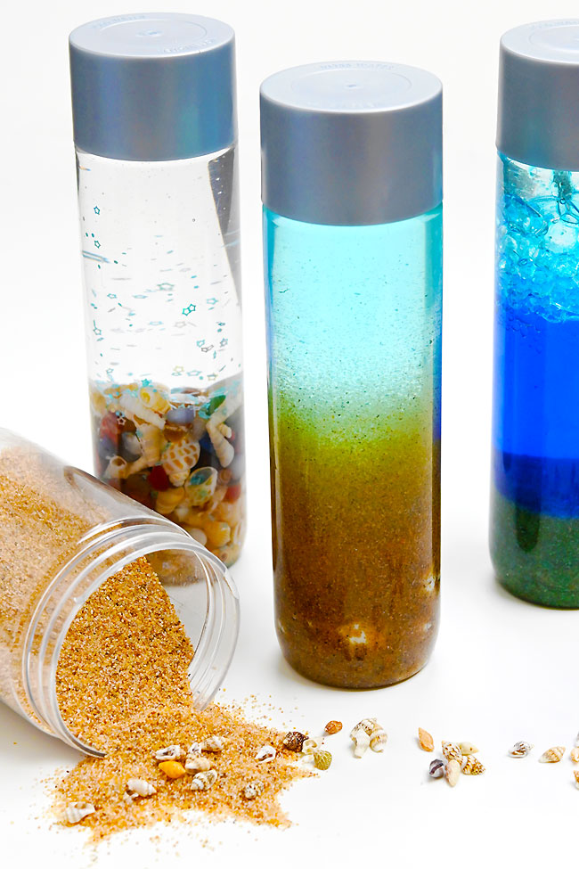 Ocean sensory bottles made with sand and seashells