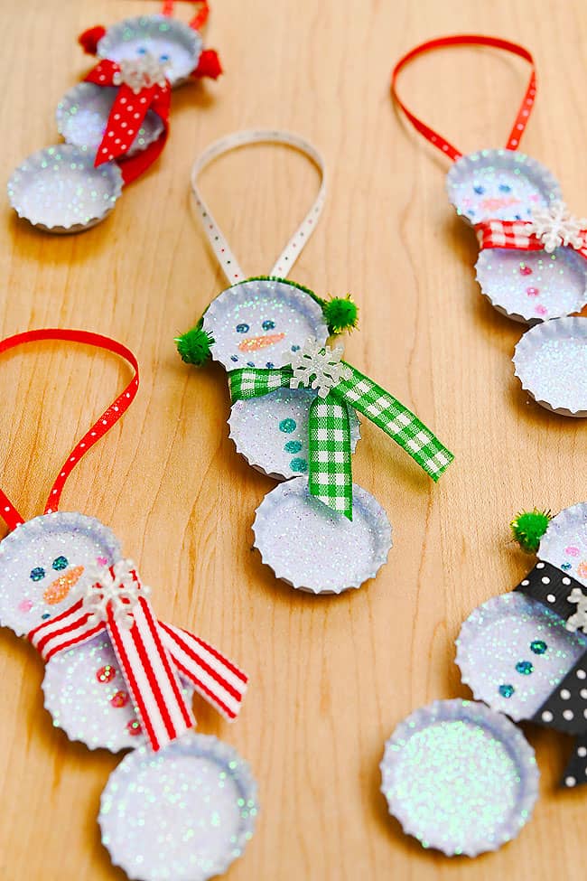 Beer Cap Snowman Craft Group of adorable snowman crafts made from beer caps