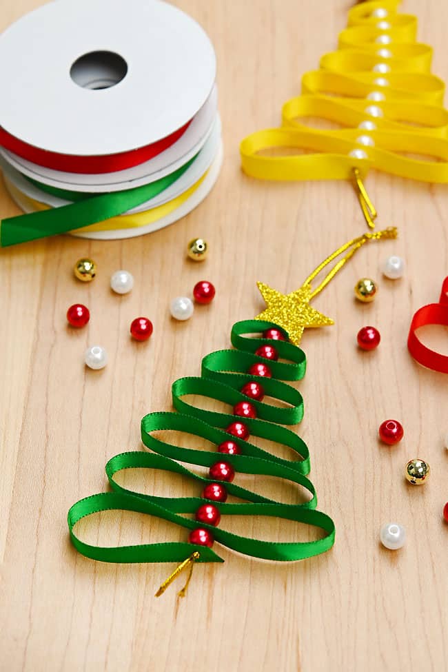 Christmas Ribbon Tree Ornament Closeup on a green Christmas ribbon tree ornament