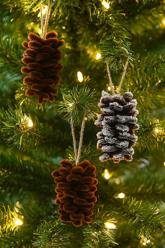 Pipe Cleaner Pinecone Pipe cleaner pinecone ornaments hanging in a Christmas tree