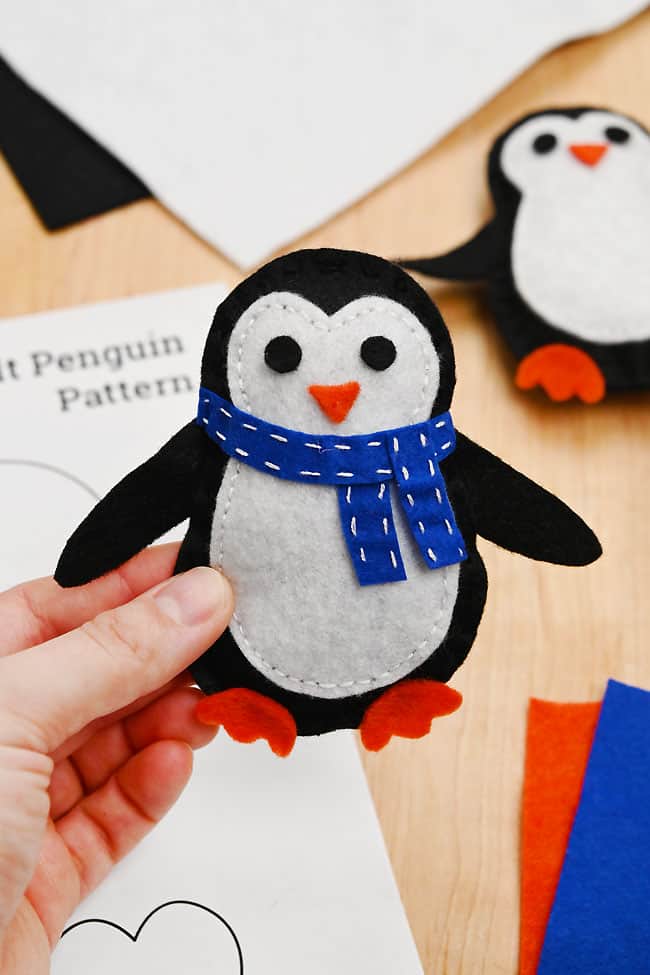 Felt Penguin Template Handsewn felt penguin beside supplies to make one
