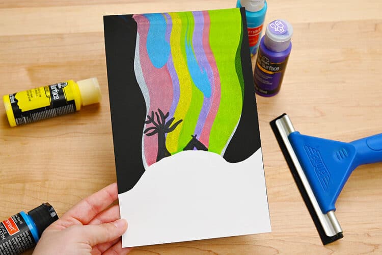 Northern Lights Squeegee Painting Northern lights scrape art project for kids