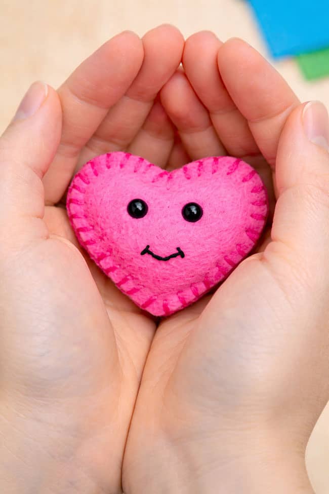 Pocket Hug DIY Holding a pink pocket hug in hands