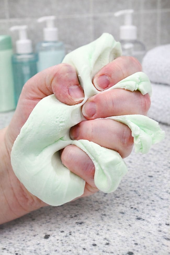 Shampoo Slime Recipe Squishing shampoo slime in a hand