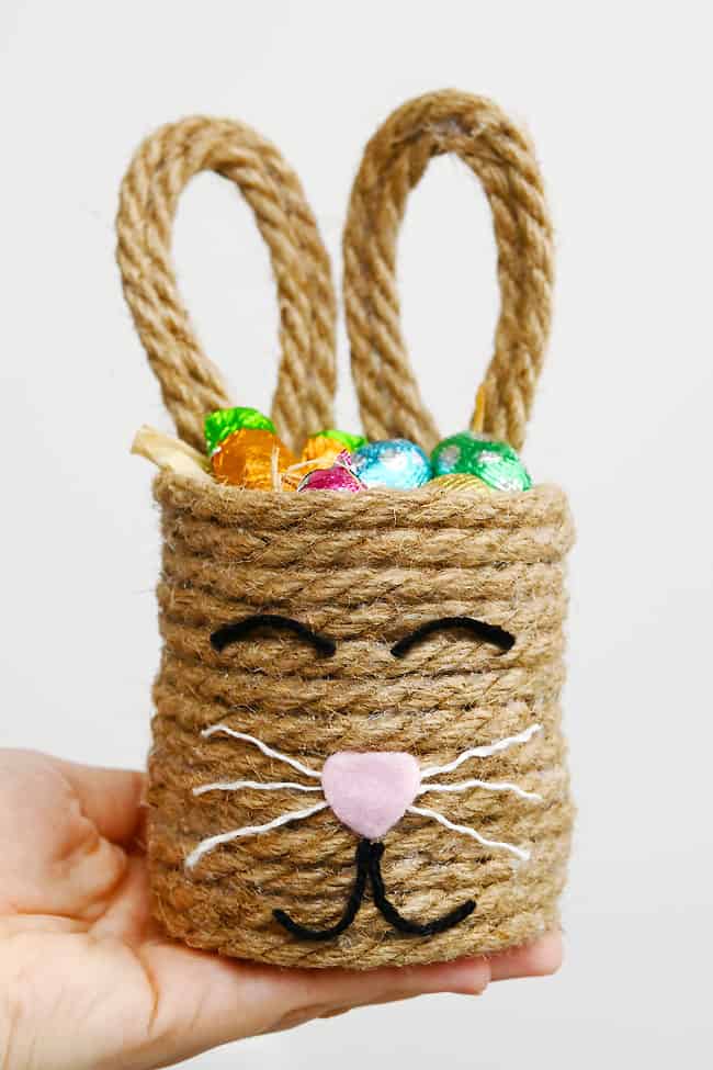 Bunny Treat Holder Holding a DIY bunny treat holder filled with Easter chocolate