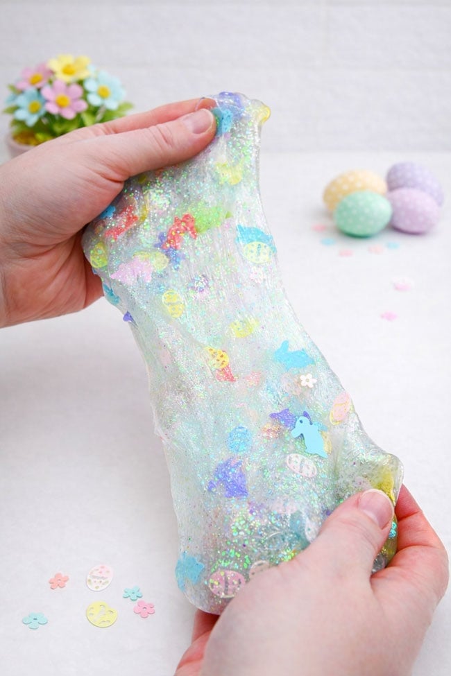DIY Easter Slime DIY Easter slime being stretched between 2 hands