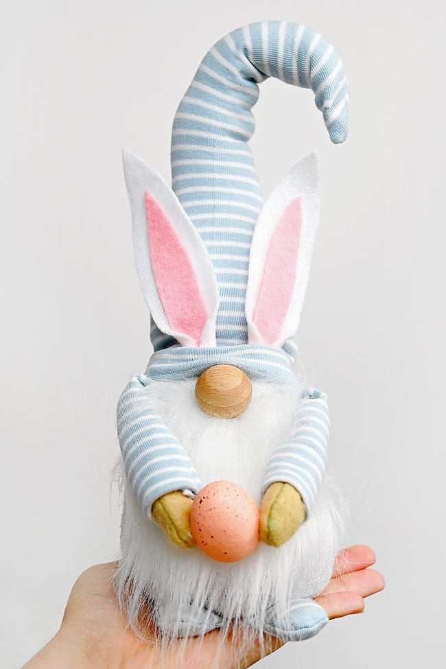 Easter Bunny Gnome Holding an Easter bunny gnome with a light blue striped hat and bunny ears