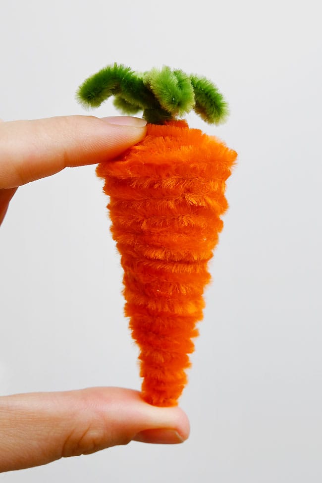 Pipe Cleaner Carrot Closeup holding a pipe cleaner carrot