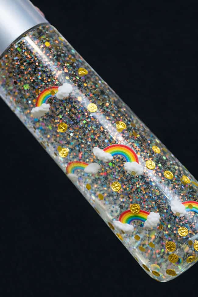 St Patrick's Day Sensory Play Closeup on a rainbow and gold coin sensory bottle