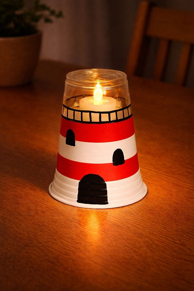 Easy Lighthouse Craft Plastic cup lighthouse with a flameless tea light candle lighting up the darkness