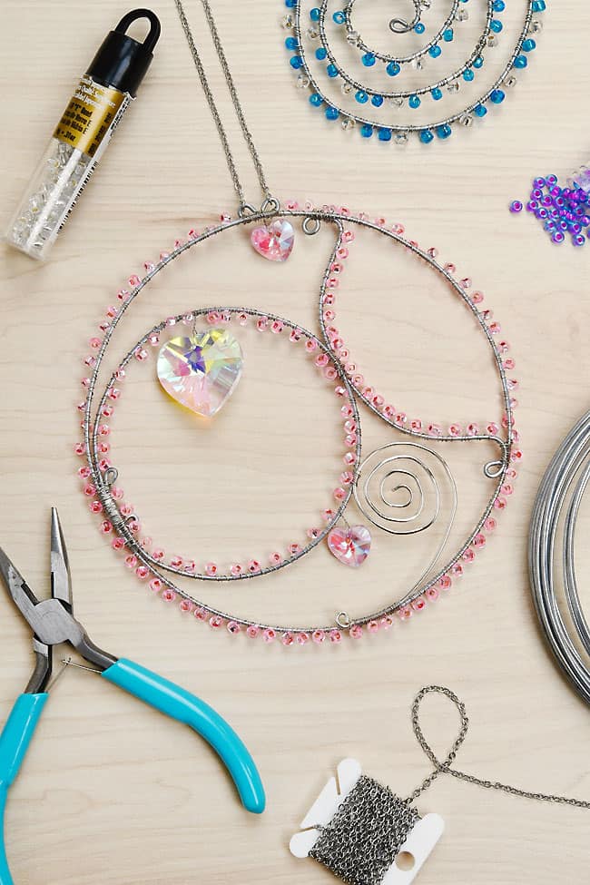 Wire Wrapping Suncatcher Tutorial The pink heart wire wrapping suncatcher with craft supplies to make one