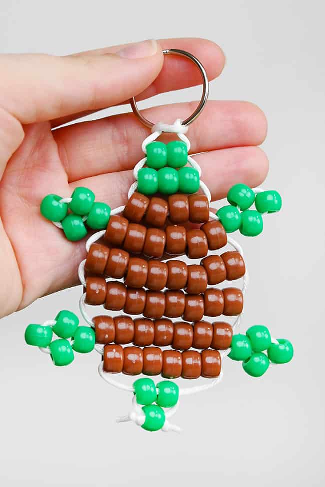 Beaded Turtle Keychain Holding a beaded turtle keychain