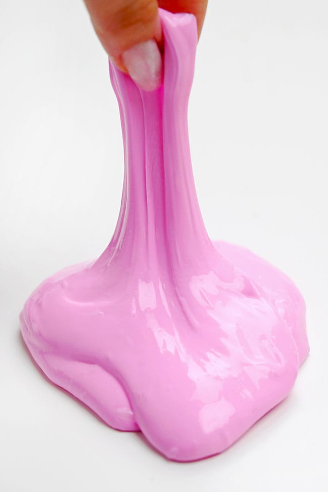 Slime Chemistry for Kids Stretching up pink glossy slime