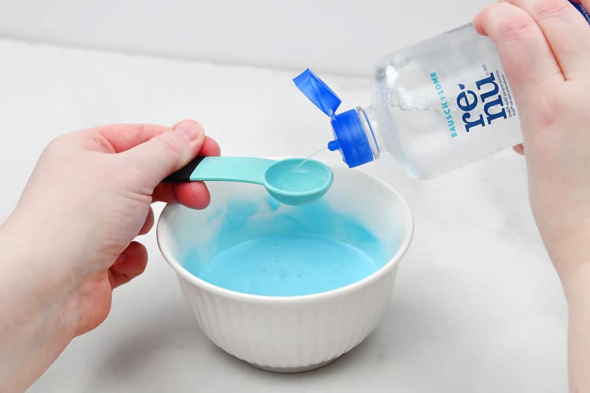 What is Slime Made of Adding contact lens solution to a glue mixture to make slime form