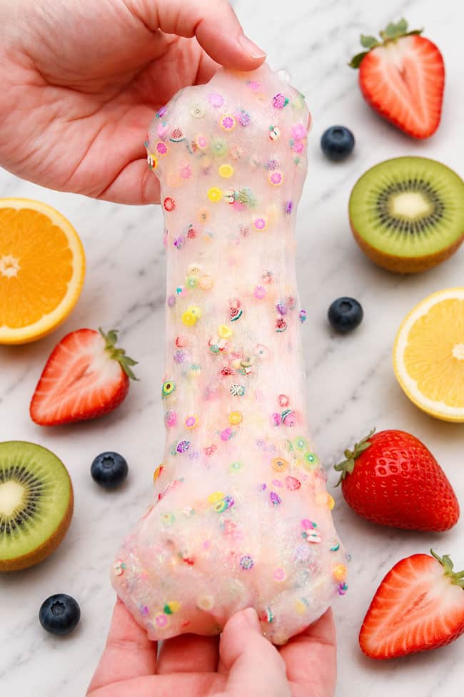 Clear Fruit Slime Stretching clear fruit slime with clay fruit charms