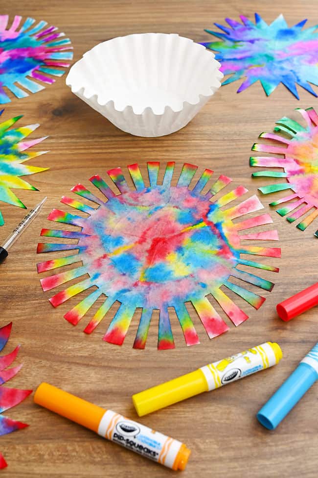 Fireworks Craft for Kids Tie dye looking coffee filter firework with craft supplies to make more