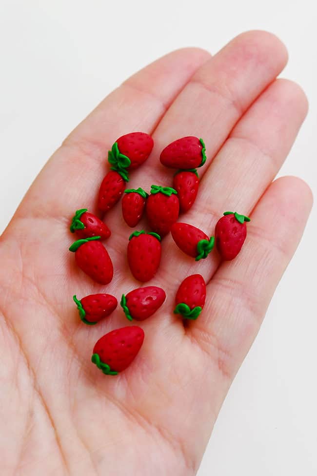 Polymer Clay Fruit Holding mini strawberries made from polymer clay