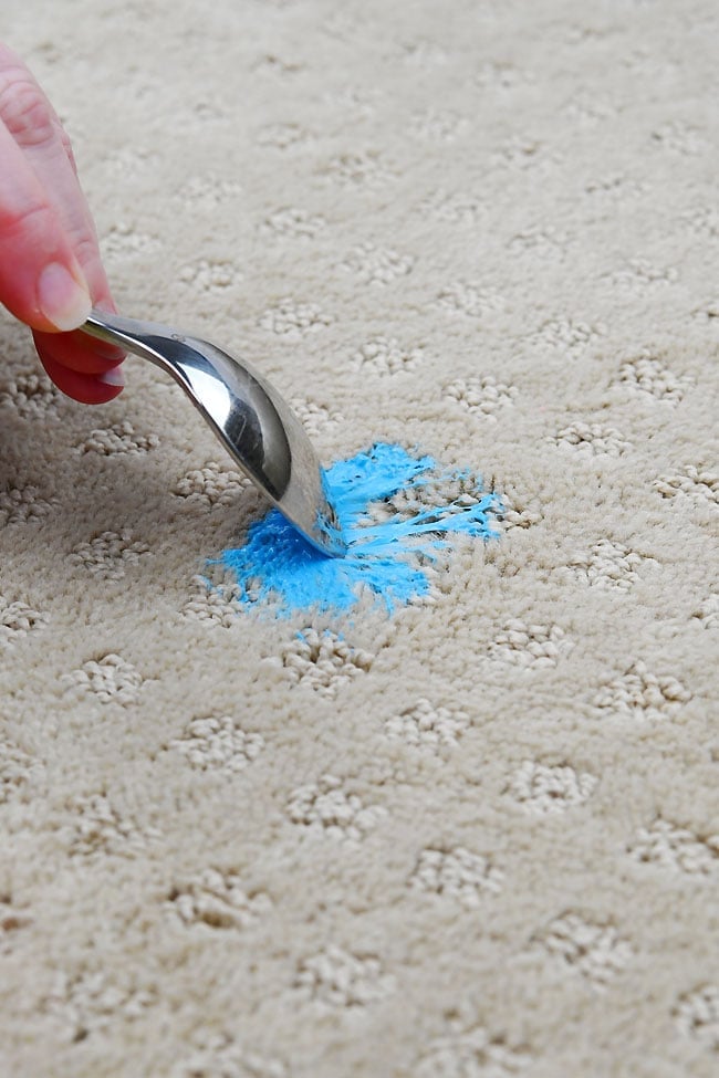 How to Get Slime Off Carpet Scraping slime from carpet with a spoon