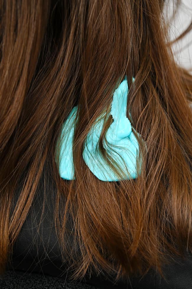 Blue slime stuck in hair