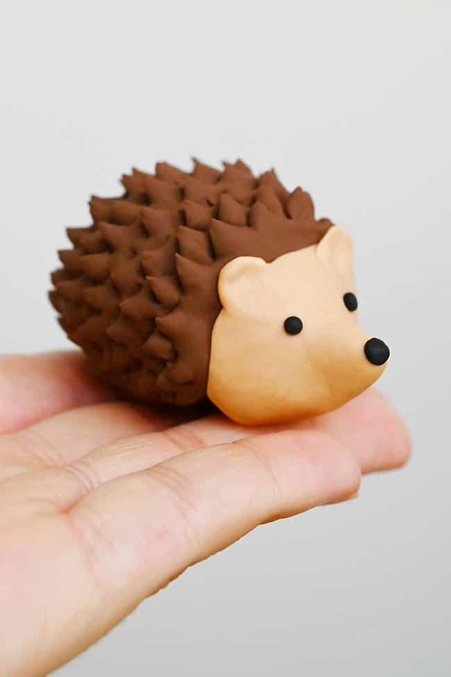 Polymer Clay Hedgehog Holding a polymer clay hedgehog