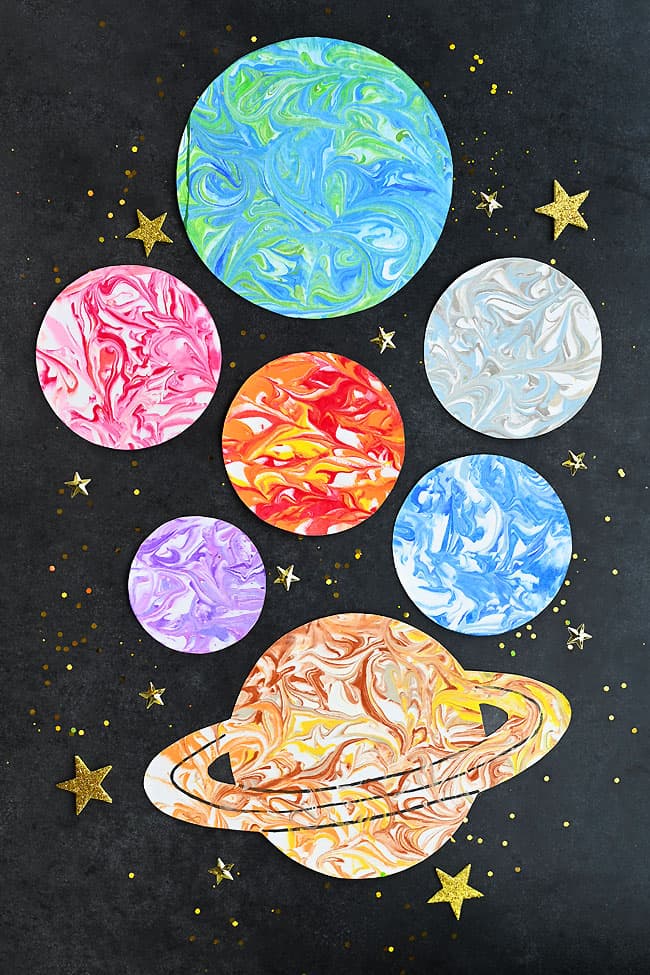 Shaving Cream Marbled Planets Marbled solar system made with shaving cream and acrylic paint