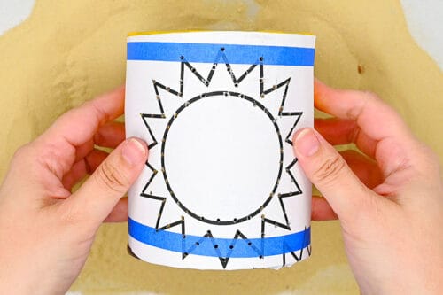 Tin can lanterns