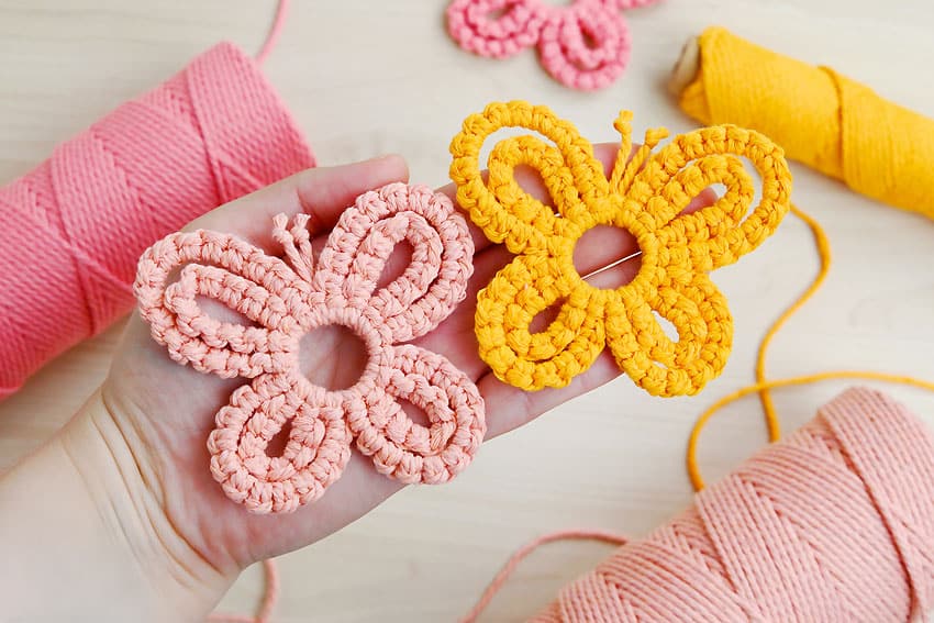 DIY Macrame Butterfly Holding DIY macrame butterflies